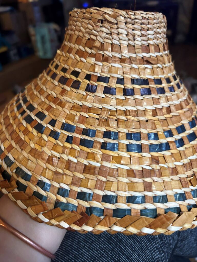 Tan and blue woven cedar hat